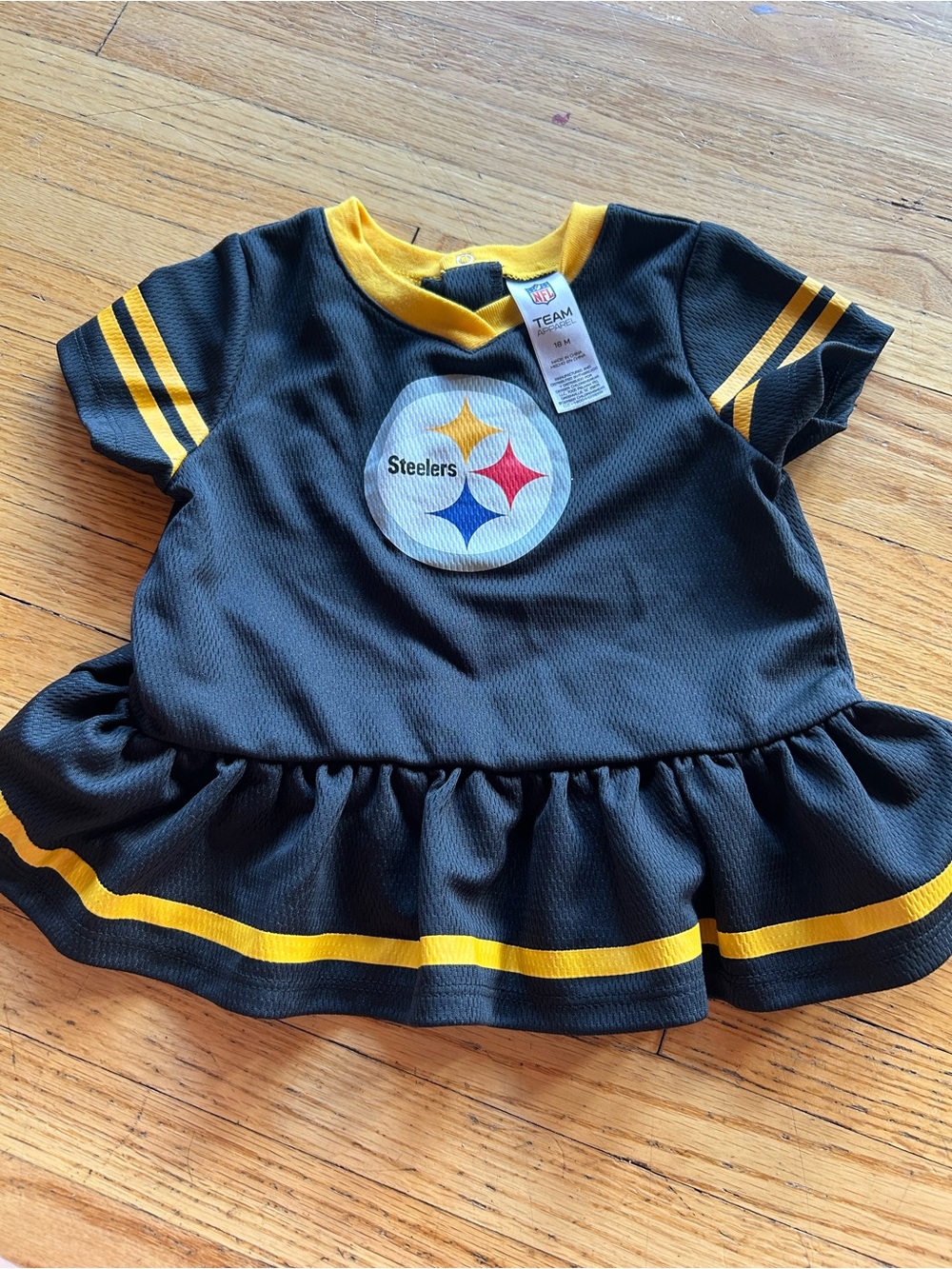 Girls' Pittsburgh Steelers Black & Gold Ruffle Short Sleeve Tee